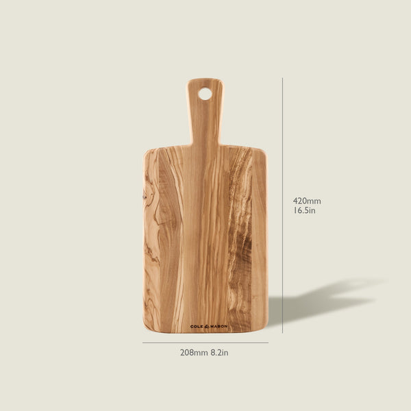 The Cole & Mason Portobello Olive Wood Serving Board, rectangular with a handle and measuring 420mm x 208mm, is displayed upright on a light background.