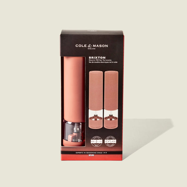 Cole & Mason Brixton Electric Mill Terracotta GS, featuring a premium ceramic grinding system, packaged in a black and clear box with product images and branding on the front.