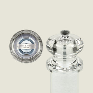 #salt&pepperset
A clear acrylic Cole & Mason 505 Salt & Pepper Mill, shown from top and side, reveals the grinding mechanism and salt crystals. The top view features the brand label, highlighting its adjustable settings and durable acrylic design.