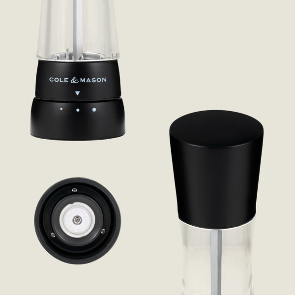 #salt&pepperset The Cole & Mason Derwent Matt Black Salt & Pepper Mills are displayed from the front, top, and bottom, featuring a modern black and clear acrylic design with control buttons and adjustable ceramic grind settings.