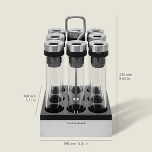 The Shadwell Countertop Spice Storage by Cole & Mason features eight airtight glass tubes with metal lids in a sleek black and silver stand—perfect for stylish, organized countertop storage (220mm H x 140mm W x 140mm D).