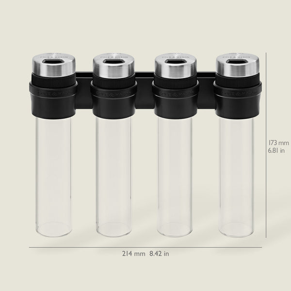The Cole & Mason Shadwell Slim-Mount Spice Storage features four clear airtight glass containers with silver lids in a black rack, measuring 173 mm high and 214 mm wide.